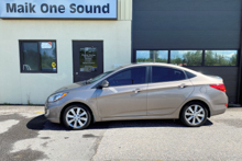 2014 Hyundai Accent with professional window tint in North Bay